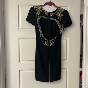 Sexy little black dress gold accents